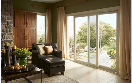 Vinyl patio door in a living room looking out to the garden